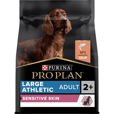 Purina Pro Plan Large Athletic Adult 2+ Sensitive Skin hondenvoer, No1 ingrediënt zalm, verpakking met afbeelding van een hond en tekst over gevoelige huid. Purina Pro Plan Large Athletic Adult 2+ Sensitive Skin hondenvoer, No1 ingrediënt zalm, verpakking met afbeelding van een hond en tekst over gevoelige huid.