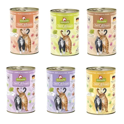 Six tins of GranataPet DeliCATessen cat food, each with different flavours and coloured labels. Visible text includes brand name and flavour names such as veal & coney, pheasant & coney, chicken pure.