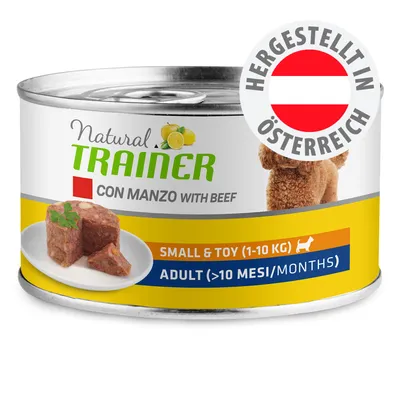 Natural Trainer con manzo with beef, dåse med billede af hundemad. Tekst: SMALL & TOY (1–10 kg), ADULT (>10 mesi/months). Mærke: Hergestellt in Österreich.