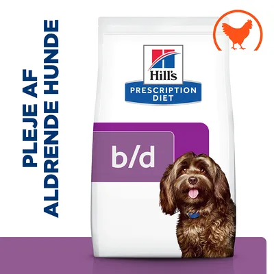 Hill's Prescription Diet b/d tørfoder med billede af hund, teksten 'PLEJE AF ALDRENDE HUNDE' og orange kyllingesymbol øverst til højre på posen.