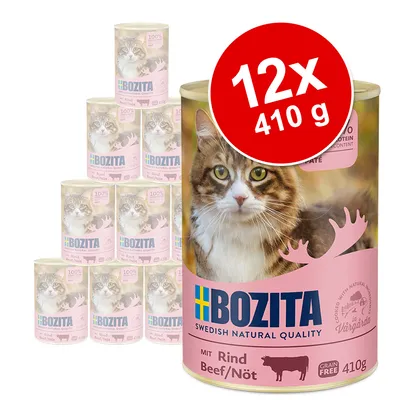 BOZITA Rind Beef/Nöt, 12×410 g konzerv pro kočky, růžové balení s obrázkem kočky a nápisem Grain Free. Velký červený kruh s textem 12x 410 g.