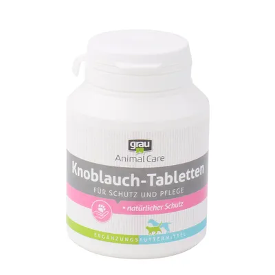 Boîte de comprimés grau Animal Care Knoblauch-Tabletten, texte visible : Für Schutz und Pflege, natürlicher Schutz, Ergänzungsfuttermittel. Étiquette avec icône animal et main.