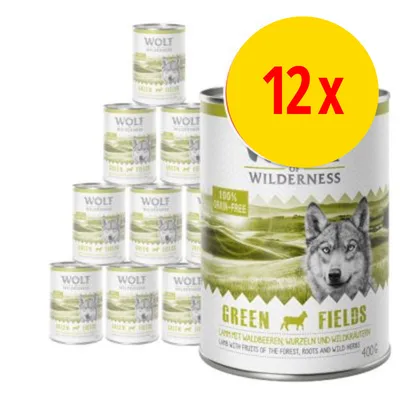 12 x Wolf of Wilderness Green Fields dåser, 400 g. 100% grain-free. Synlig tekst: Lamm mit Waldbeeren, Wurzeln und Wildkräutern. GREEN FIELDS. Lam med bær, rødder og urter.