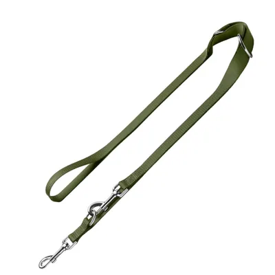 Green dog lead made of durable material with adjustable length and metal snap hook.