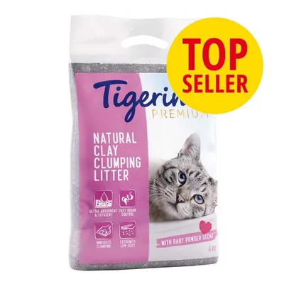 Tigerino Premium Natural Clay Clumping Litter, con aroma a talco para bebé, 6 kg. Texto destacado: TOP SELLER. Iconos: ultra absorbente, control de olores, aglomerante inmediato, bajo polvo.
