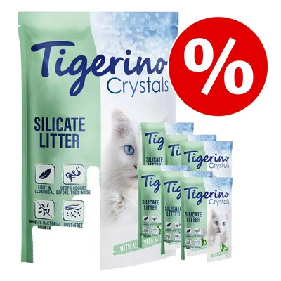 Tigerino Crystals Silicate Litter kattegrus med tekst: Light & economical, stops odours before they arise, inhibits bacterial growth, dust-free. Stor rød procent-tegn for tilbud.