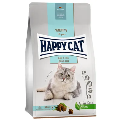Happy Cat Sensitive 1+ years Haut & Fell skin & coat -kuivaruokapakkaus, kuvassa harmaa kissa, All in One Natural Life Concept -merkintä, ei säilöntäaineita, valmistettu Saksassa.
