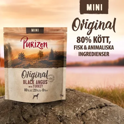 Purizon Original Black Angus with Turkey MINI, 1 kg. 80 % kött, fisk & animaliska ingredienser. Text: 80 % kött, 20 % grönsaker, 0 % spannmål. Bild på förpackning utomhus.