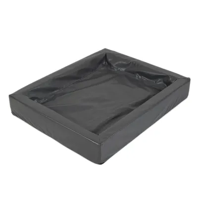 Cama rectangular para mascotas de color gris oscuro, con bordes elevados y superficie de material similar al cuero o plástico.