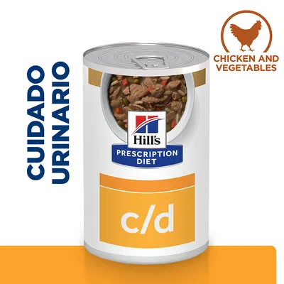 Lata de Hill's Prescription Diet c/d, cuidado urinario. Texto visible: CHICKEN AND VEGETABLES. Imagen del alimento húmedo con trozos visibles de carne y verduras. Lata de Hill's Prescription Diet c/d, cuidado urinario. Texto visible: CHICKEN AND VEGETABLES. Imagen del alimento húmedo con trozos visibles de carne y verduras.