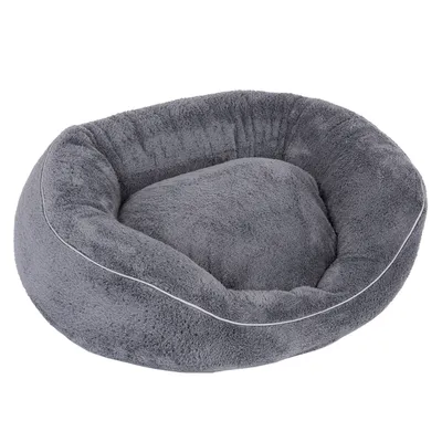 Grey, oval pet bed made of soft plush material with raised edge and padded lying surface.