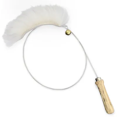 Toy with wooden handle, flexible wire and white feather attachment. Toy with wooden handle, flexible wire and white feather attachment.