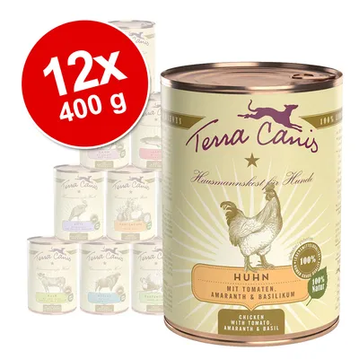 Terra Canis kutyaeledel, csirke paradicsommal, amaránttal és bazsalikommal. 12×400 g kiszerelés, felirat: Huhn mit Tomaten, Amaranth & Basilikum.