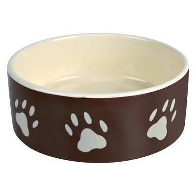Ceramiczna miska w brązowym kolorze z białymi odciskami łapek na zewnątrz, wnętrze jasne. Widoczny materiał: ceramika.
