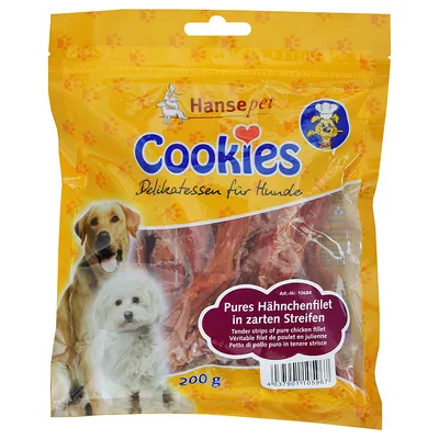 Hansepet Cookies Delikatessen für Hunde, 200 g. Pures Hähnchenfilet in zarten Streifen. Förpackning med hundgodis av kycklingfilé i strimlor, synlig genom plastpåsen.