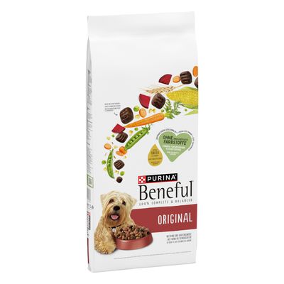 Due confezioni di Purina Beneful Glückliche Jahre 7+ con cane, ciotola viola e verdure. Testo visibile: 'NEUE REZEPTUR, TOLLER GESCHMACK'. Simbolo percentuale arancione in alto a destra.