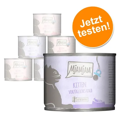 MjAMjAM Kitten Vorzügliches Kalb, getreidefrei. Jetzt testen! Mehrere Dosen Katzenfutter für Kätzchen sichtbar.