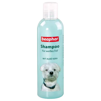 beaphar Shampoo Für weißes Fell MIT ALOË VERA, flaske med billede af hvid hund på etiketten. Synlig tekst er på tysk.