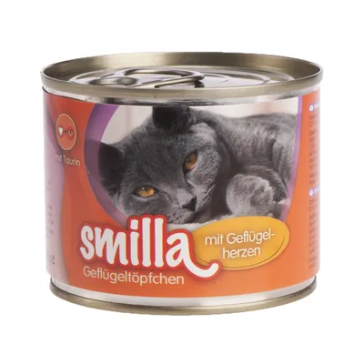 Blik Smilla kattenvoer, tekst: 'mit Geflügelherzen', 'Geflügeltöpfchen', 'mit Taurin', afbeelding van grijze kat op het etiket. Tekst in het Duits.
