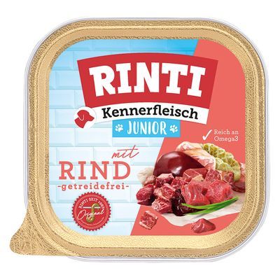 RINTI Kennerfleisch Junior mit Rind, getreidefrei. Bevat afbeelding van rundvlees en groente. Tekst: 'Reich an Omega3', '100% echt vlees Original'.