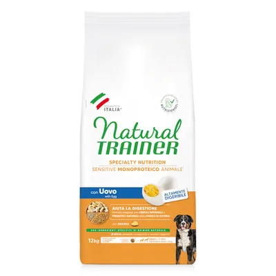Sac de 12 kg Natural Trainer Sensitive Monoproteico Animale avec œuf, mentionne 'hautement digestible', céréales complètes, ananas, sans colorants ni conservateurs ajoutés. Texte en italien.