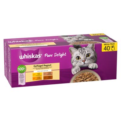 A person is feeding a cat wet food from a purple bowl. Whiskas logo visible in the bottom right corner.
