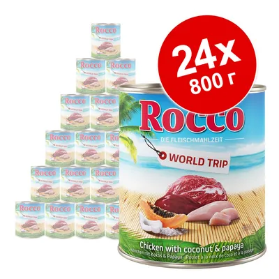 Консервы Rocco World Trip, курица с кокосом и папайей, упаковка 24×800 г. Видны банки с изображением мяса, кокоса и папайи на фоне пляжа. Консервы Rocco World Trip, курица с кокосом и папайей, упаковка 24×800 г. Видны банки с изображением мяса, кокоса и папайи на фоне пляжа.