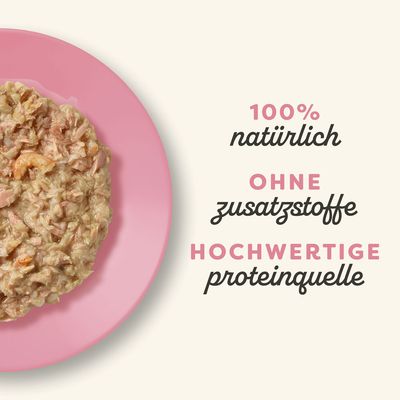 100% natürlich, ohne Zusatzstoffe, hochwertige Proteinquelle. Abgebildet ist eine Portion des Produkts auf einem rosa Teller.