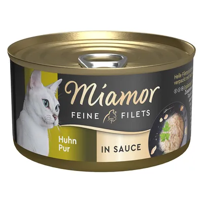 Boîte de nourriture pour chat Miamor Feine Filets, Huhn Pur, In Sauce. Image d’un chat blanc et d’un plat avec filets en sauce visibles sur l’étiquette.