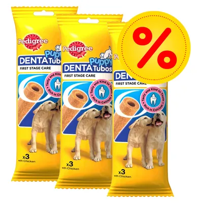 Three packs of Pedigree Puppy Denta Tubos, first stage care, with chicken, each pack contains 3 sticks. Label highlights 'Tasty and Kind to Teeth' and 'Rich in Calcium'. Percentage discount symbol shown. Three packs of Pedigree Puppy Denta Tubos, first stage care, with chicken, each pack contains 3 sticks. Label highlights 'Tasty and Kind to Teeth' and 'Rich in Calcium'. Percentage discount symbol shown.
