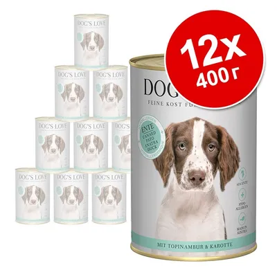 DOG'S LOVE консервирана храна за кучета, 12×400 г, с етикет ENTE и текст MIT TOPINAMBUR & KAROTTE. Видими са 12 кутии, голям червен кръг с надпис 12×400 г.