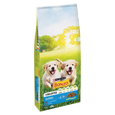 Confezione di crocchette Purina Bonzo Junior, 15 kg, con immagine di due cuccioli e testo visibile: 5 Beloftes, Junior, met kip en groenten, met melk. Testo in olandese.