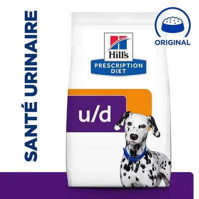 Hill's Prescription Diet u/d, paquet avec un dalmatien, texte visible : SANTÉ URINAIRE et ORIGINAL, symbole de gamelle. Emballage blanc avec bande orange et violette.