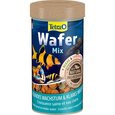 Boîte Tetra Wafer Mix, mélange d’aliments pour poissons avec algues et crevettes, mention « with natural ingredients », croquettes visibles, texte : croissance saine et eau claire.