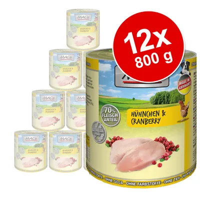 Set 12x800 g conserve MAC's Huhnchen & Cranberry, 70% Fleischanteil, fără cereale, etichetă galbenă cu piept de pui și merișoare, inscripție Made in Germany.