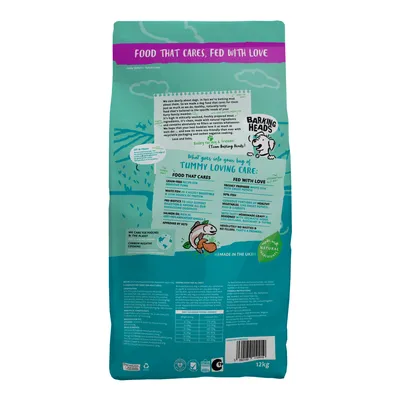 Back of pet food bag showing feeding guide, ingredient highlights such as grain-free, prebiotics, salmon oil, and natural ingredients, plus nutritional information and care claims.