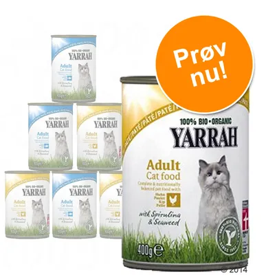 Yarrah 100% Bio Organic Adult Cat food dåser, 400 g. Synlig tekst: med spirulina & seaweed. Orange cirkel med teksten 'Prøv nu!'. Billede af kat på emballagen.