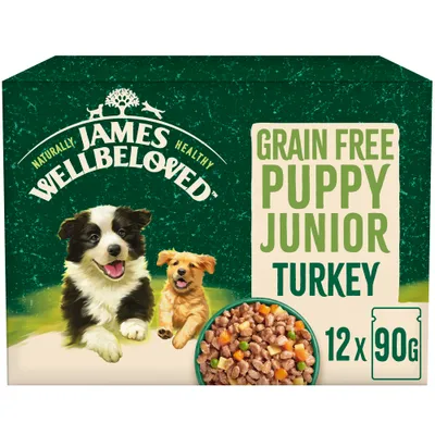Grain free puppy junior turkey, 12 packs of 90g each. Image shows food pieces with vegetables.