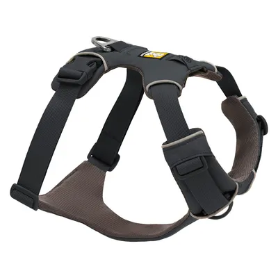 Harnais noir et gris pour chien avec boucles réglables, rembourrage intérieur et anneau métallique pour laisse. Étiquette jaune visible sur le dessus.