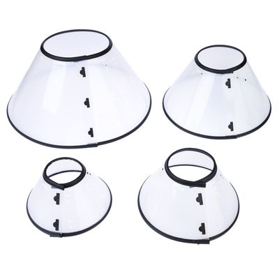 Четыре прозрачных воротника разных размеров с черной окантовкой и застежками.