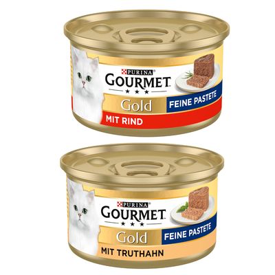 Purina Gourmet Gold Feine Pastete mit Huhn, opakowanie 48x. Na etykiecie zdjęcie białego kota i kawałka pasztetu z kurczakiem.
