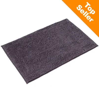 Tapis rectangulaire en tissu gris, coin supérieur droit avec texte anglais « Top Seller » sur fond orange.