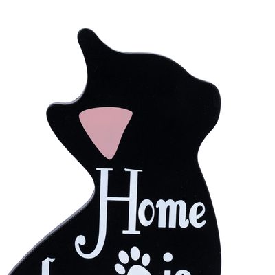 Home (texte en anglais visible sur une silhouette noire de chat avec une oreille rose)