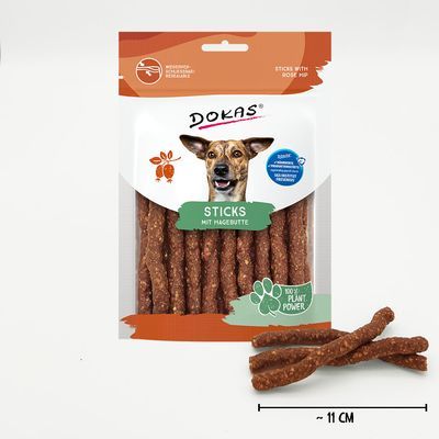 Verpakking Dokas Sticks mit Hagebutte, zichtbaar: 100% Plant Power, sticks met rozenbottel, lengte ca. 11 cm, tekst deels in het Duits en Engels.
