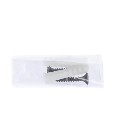 Packaging with black screws and white plugs, suitable for mounting purposes.