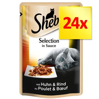 Sheba Selection in Sauce, mit Huhn & Rind, 24x. Opakowanie z wizerunkiem kota i talerzem karmy w sosie. Tekst częściowo po niemiecku i francusku. Sheba Selection in Sauce, mit Huhn & Rind, 24x. Opakowanie z wizerunkiem kota i talerzem karmy w sosie. Tekst częściowo po niemiecku i francusku.
