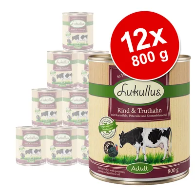 Lukullus Rind & Truthahn Adult, 12 x 800 g dåser. Synlig tekst: mit Kartoffeln, Petersilie und Sonnenblumenöl. Billede af ko og kalkun på etiketten.