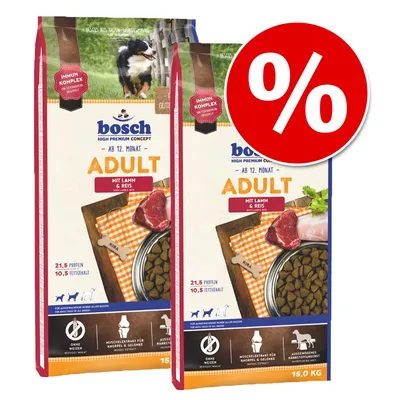 Aanbieding: 2 zakken bosch Adult hondenvoer met lamsvlees & rijst, 15 kg per zak. Tekst: 21,5% eiwit, 10,5% vetgehalte, zonder tarwe. Groot rood procentteken zichtbaar.