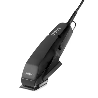 Tondeuse électrique noire avec fil, marque WAHL, modèle 1400 visible sur le dessus de l'appareil. Lame métallique apparente à l'avant.