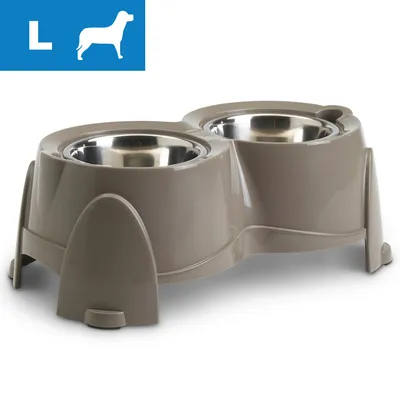 Gamelle double pour chien taille L, support en plastique beige avec deux bols amovibles en métal. Pictogramme chien et lettre L visibles en haut à gauche.